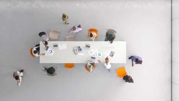 Business people talking and meeting around a white conference table